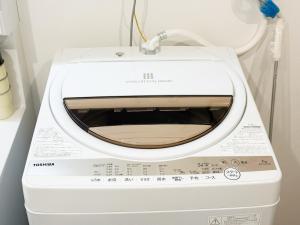 Newly built in 2026 Entire building-single unit with 3 bedrooms-can accommodate 7 people Free parking Direct access to USJ Namba Kyocera Dome