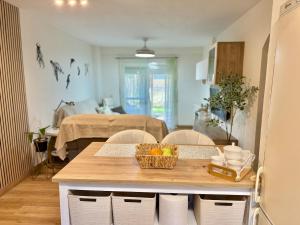 Charming Pet-Friendly Beach Apartment with Private Garden & Pool Access