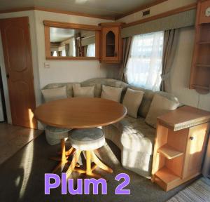 Plum 2, luxury 3 bed 8 berth, gas central heating, bedding included, Static caravan with large wrap around secure veranda on Coral Beach in Ingoldmells