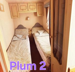 Plum 2, luxury 3 bed 8 berth, gas central heating, bedding included, Static caravan with large wrap around secure veranda on Coral Beach in Ingoldmells