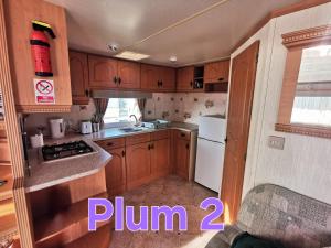 Plum 2, luxury 3 bed 8 berth, gas central heating, bedding included, Static caravan with large wrap around secure veranda on Coral Beach in Ingoldmells