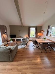 Huis Specht is perfect voor vakantie nabij meer en tuin op zuiden