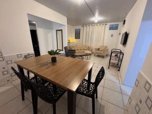 Quartos com AR no centro - Garagem - check in 24h