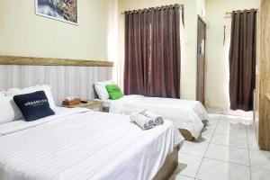 Urbanview Hotel Maulana Hills Syariah