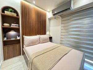 Cozy 1 BR condo unit near Tomas Morato