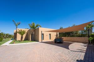 Villa prestige, terrain padel, salle de sport, hammam