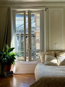 Elegant & Warm Haussmann Flat with Rare Private Terrace