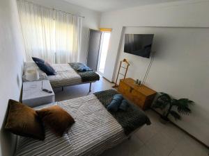 T2 Junto à praia, com lençóis, toalhas, WIFI, Churrasqueira, 3ºpiso sem elevador