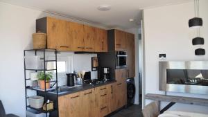 Ferienhaus Meeresbrise - ANKERPLATZ DAHME, Urlaub in Dünengelände mit Strandkorb,