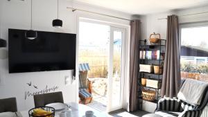 Ferienhaus Meeresbrise - ANKERPLATZ DAHME, Urlaub in Dünengelände mit Strandkorb,