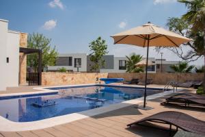 Casa cómoda en Zakia Alberca, terraza y Aire Acondicionado