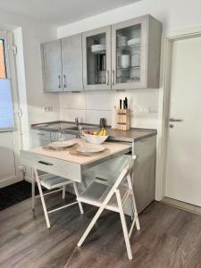 Hafenglück - moderne Ferienwohnung direkt am Hafen in Carolinensiel