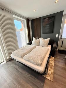 Hafenglück - moderne Ferienwohnung direkt am Hafen in Carolinensiel