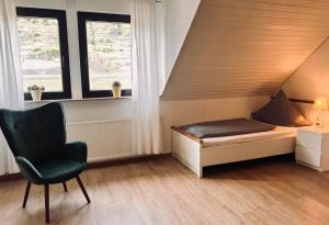 Ferienwohnung Moselflair mit direktem Blick auf die Mosel und Weinberge