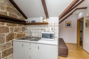 Apartment and Rooms Desideria