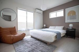 Modern 4BR Stay in Ozu Hachikubo for 11 Guests by Restavio