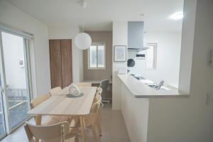 Modern 4BR Stay in Ozu Hachikubo for 11 Guests by Restavio
