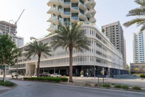 Private Pool 1BR in JVC - Modern & Relaxing