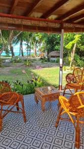 Maayun, Seaside Villa with Large Upper Veranda 7pax