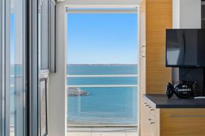 Panoramic Sea View Top-Floor Waterfront Apartment