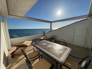 ATTICO VISTA MARE - Un Letto Ideale