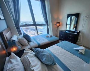 Zigzag Tower B - Stylish at Pearl, 2 BR, pool, parking and sea view-1705