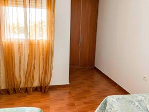 Apartamentos Tranquilos Conil Facil Aparcamiento con patio interior solo capetamos familias y parejas