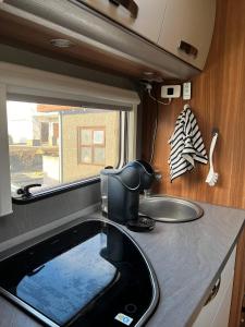 The Rock , Heimaklettur Campervan