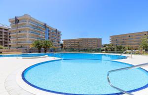 Apartamento tipo Resort, cerca playa, con parking