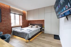 Brick Loft Studio - Stylowy apartament dla dwojga by FengShui4u
