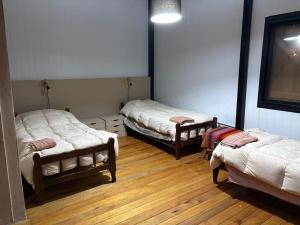 Suma Qamaña - Casa en la montaña al lado del río