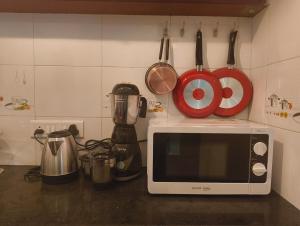 Cozy Breeze - Ocean Inspired Spacious 2BHK Stay