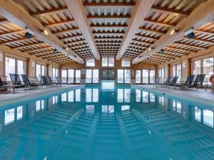 Appartement Arc 1950 Skis aux Pieds avec Piscines et Jacuzzi - FR-1-686-22