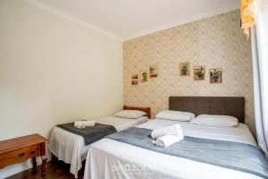 Casa c pisc. em Cond. a passos da Praia ING0023