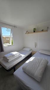 Mobilhome 6 pers-vue bassin-plage-clim