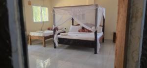Luxurious 4-Bedroom Holiday House with Pool Access in Diani Beach