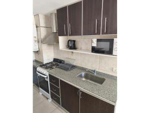 Departamento Planta Baja excelente ubicación 2 dormitorios cochera piscina seguridad