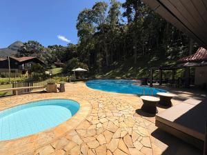 Casa 03 Vale Boa Vista - Charme Rústico em Condomínio com Área de Lazer Completa