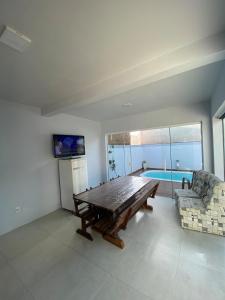 Sobrado ideal para suas férias com piscina