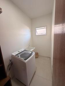 Sobrado ideal para suas férias com piscina