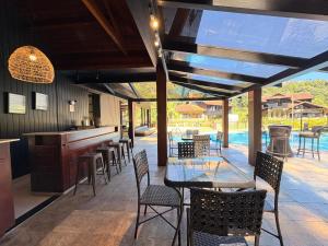 Casa 05 Vale Boa Vista - Refúgio Moderno em Condomínio Exclusivo