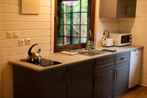 Holiday home with a fireplace and a large terrace