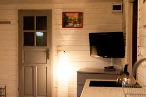 Holiday home with a fireplace and a large terrace