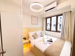 An Elegant Cozy Suite at S Residences & Netflix I S RES 1214