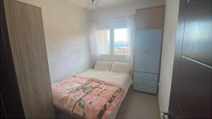 Bright spacious one-bedroom apartment with stunning seaview of Boka Bay right by the beachfront