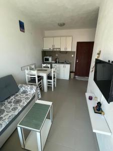 Bright spacious one-bedroom apartment with stunning seaview of Boka Bay right by the beachfront