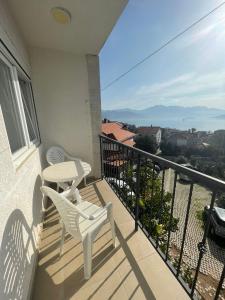 Bright spacious one-bedroom apartment with stunning seaview of Boka Bay right by the beachfront