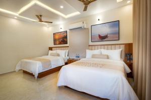 Saranvi Resorts 2BR Near Beach by Homeyhuts