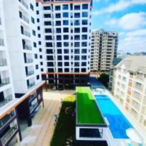 serene stays apartment with fully equipped gym , heated swimming pool ,private parking space and amazing scenic views