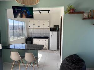 Sobrado novo com AC, terraço e suíte